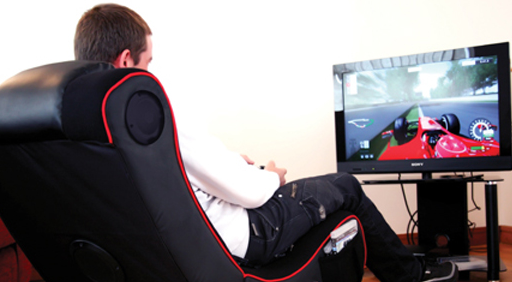 An immersive, high end gaming chair with custom installed speakers.